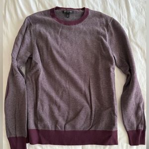 Men's maroon sweater.